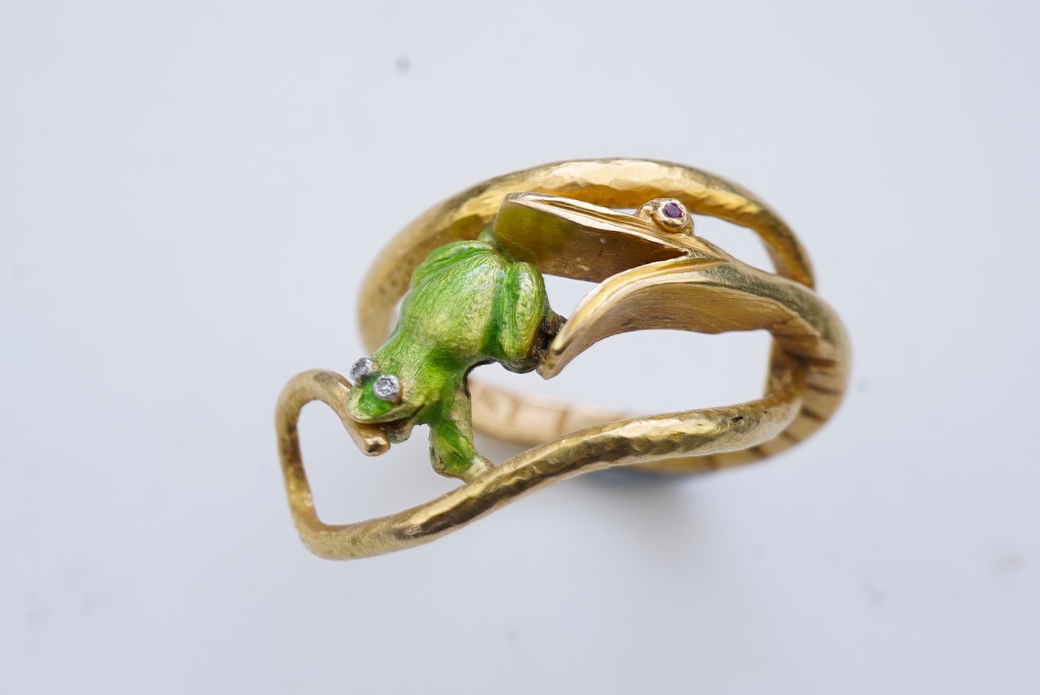 An unusual gold and enamel novelty ring